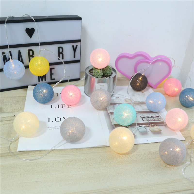 Whacky Wino LED cotton thread starry lanterns glowing with warm light, perfect for cozy decor or festive occasions.