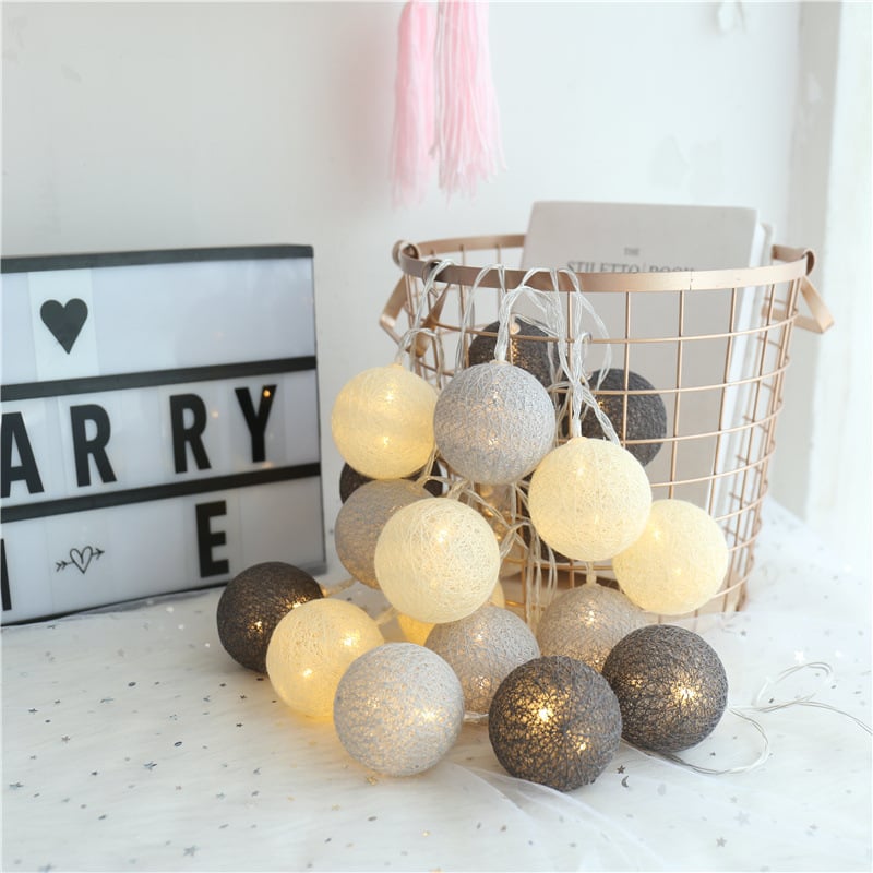 Whacky Wino LED cotton thread starry lanterns hanging with glowing star patterns on the surface.