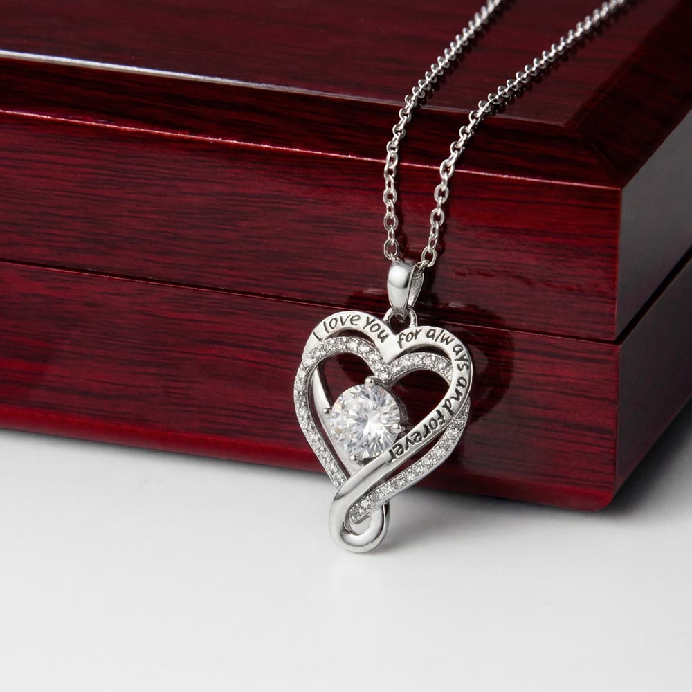 Engraved open heart necklace with CZ center stone from ShineOn Fulfillment, showcasing a delicate jewelry piece with love-themed design.