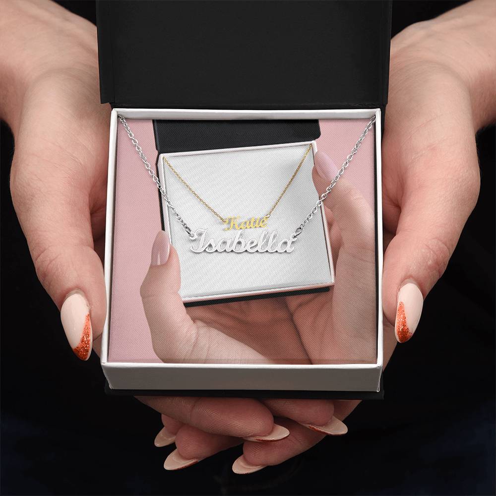 Gold or silver personalized name necklace in cursive script, displayed on a jewelry stand, showcasing elegant custom jewelry design.