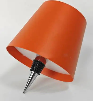 Whacky Wino wine bottle lamp with a sleek design, showcasing a lit wine bottle with a warm glow on a dark background.