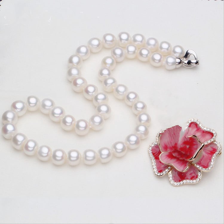 Natural freshwater pearl necklace by Whacky Wino featuring a string of lustrous white pearls on a delicate chain.