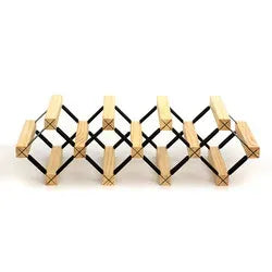 Modular square wine rack by Whacky Wino featuring pine wood shelves and a black metal frame for stylish wine storage.