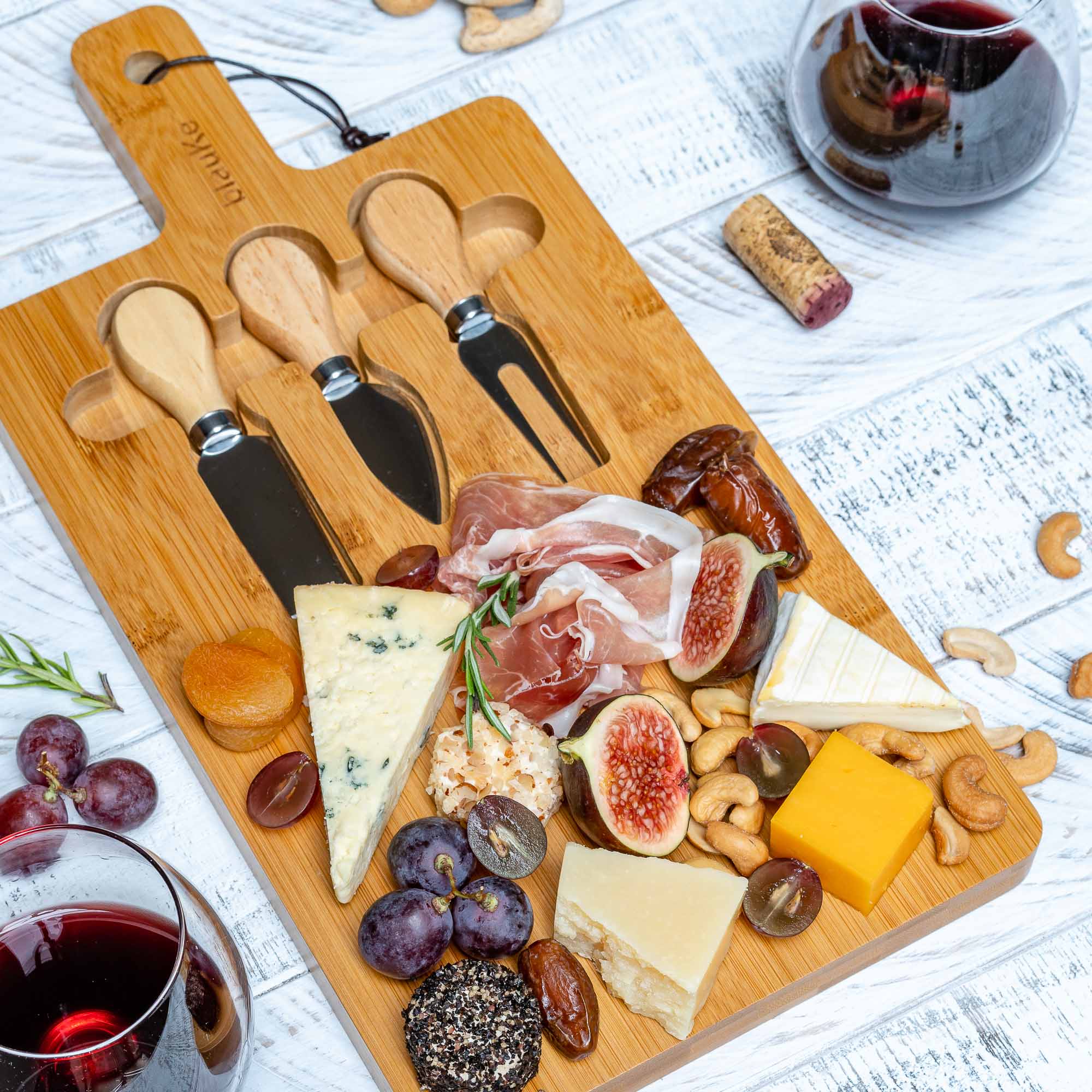 Whacky Wino 12x8 inch bamboo charcuterie board with magnetic cutlery storage, perfect for serving cheese and snacks.