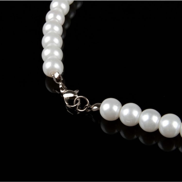 Natural freshwater pearl necklace from Whacky Wino featuring lustrous white pearls on a delicate chain.