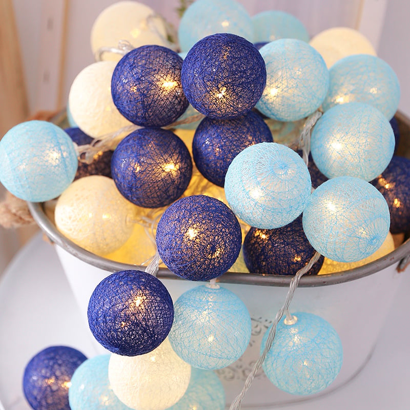 Whacky Wino LED cotton thread starry lanterns hanging with glowing star-shaped lights in a cozy indoor setting